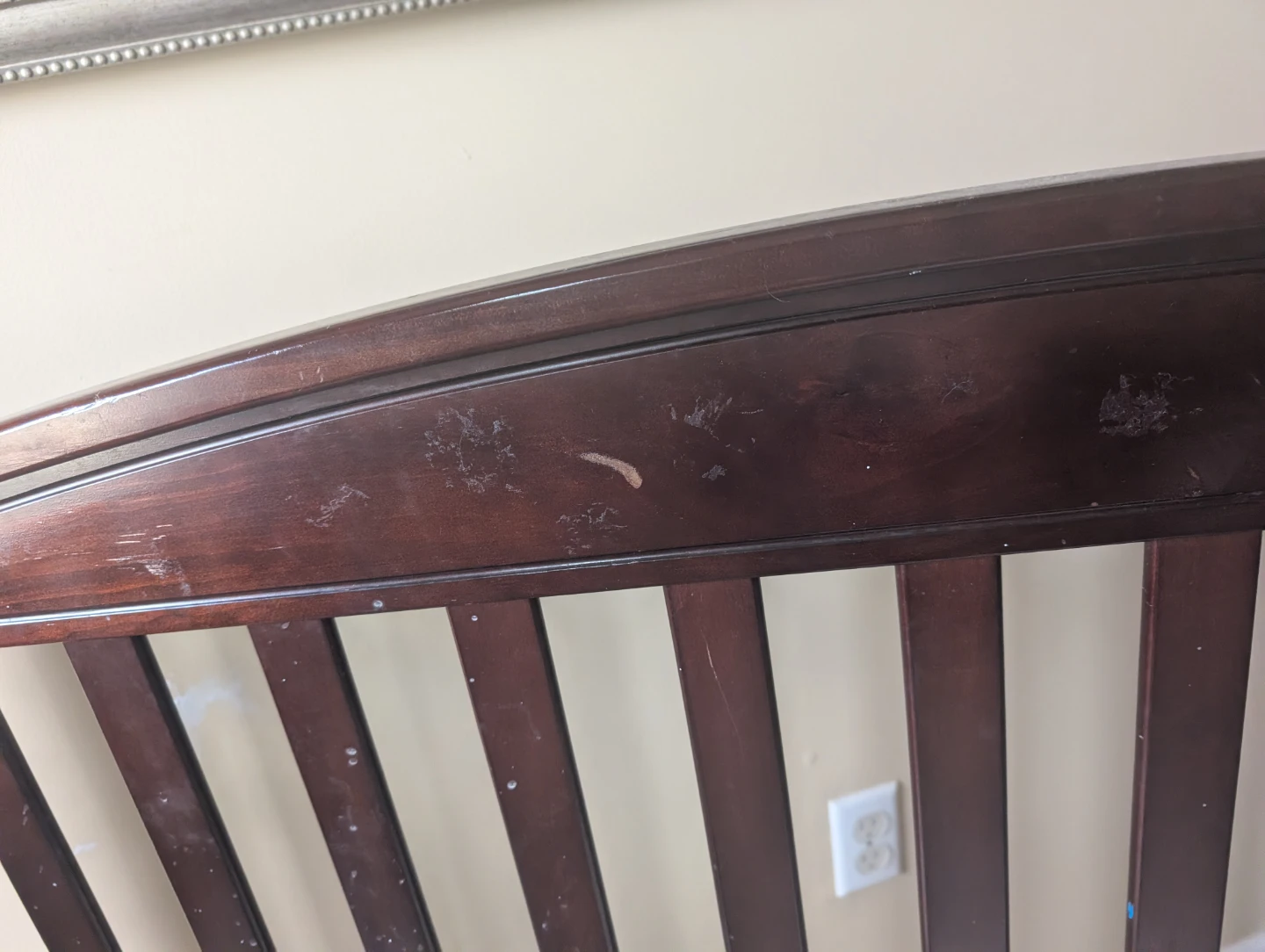 Dark brown wooden baby crib has marks - photo 2