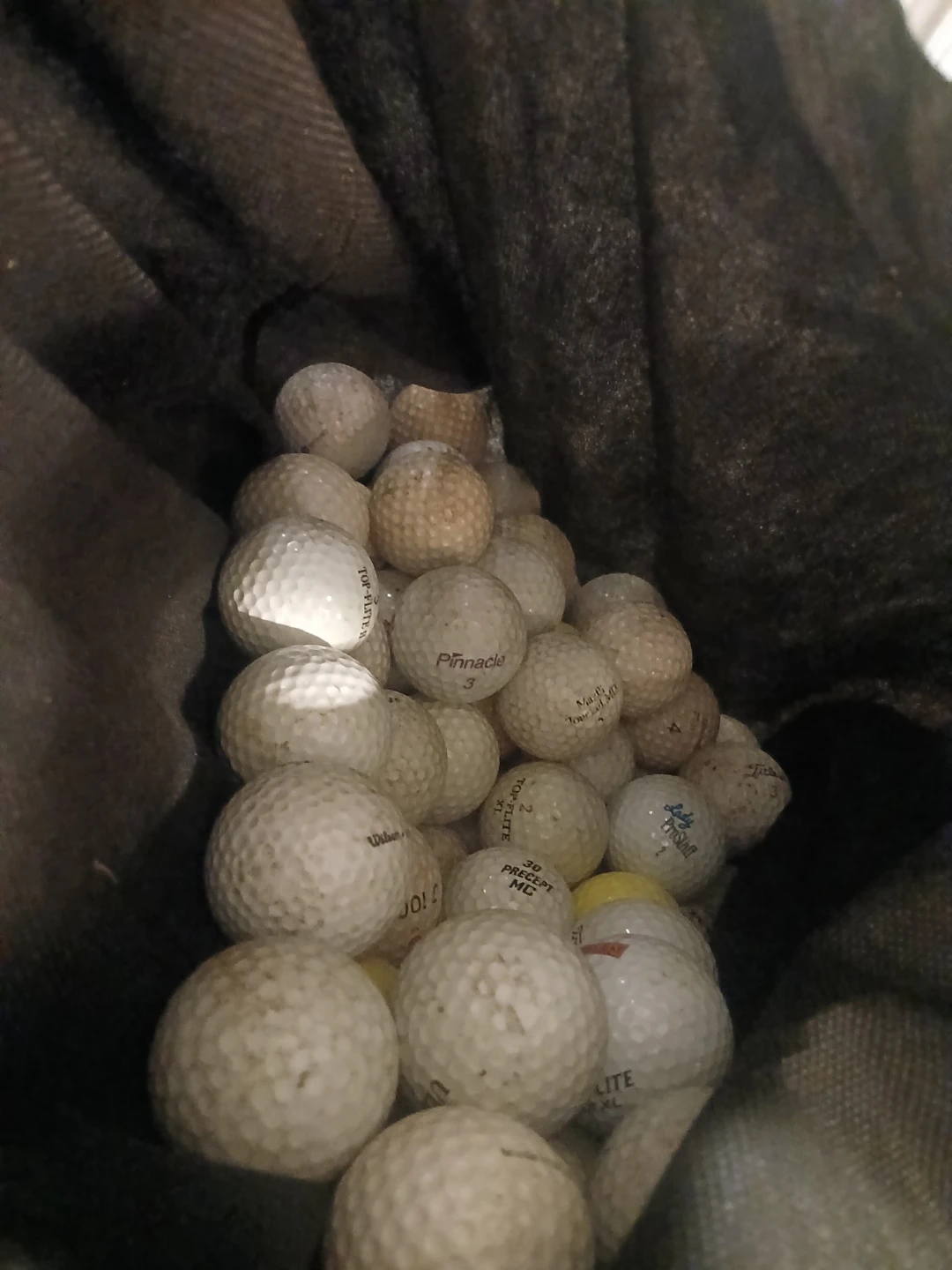 bag of vintage golf balls