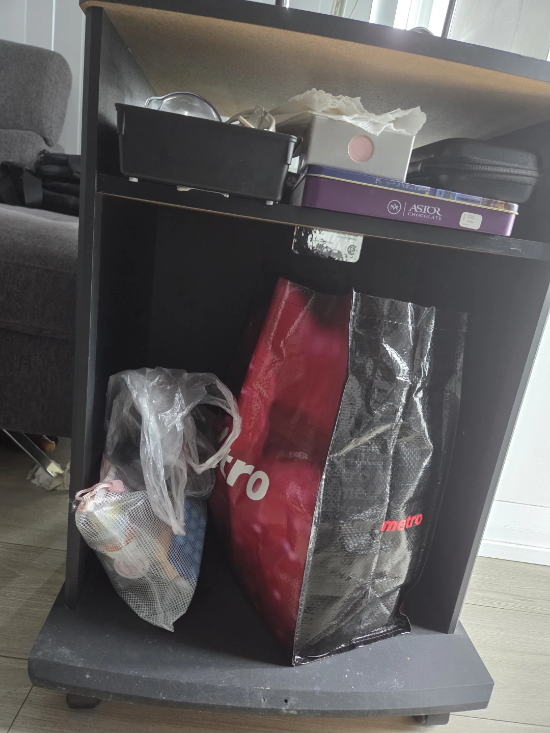 Black rolling bedside table or storage cart