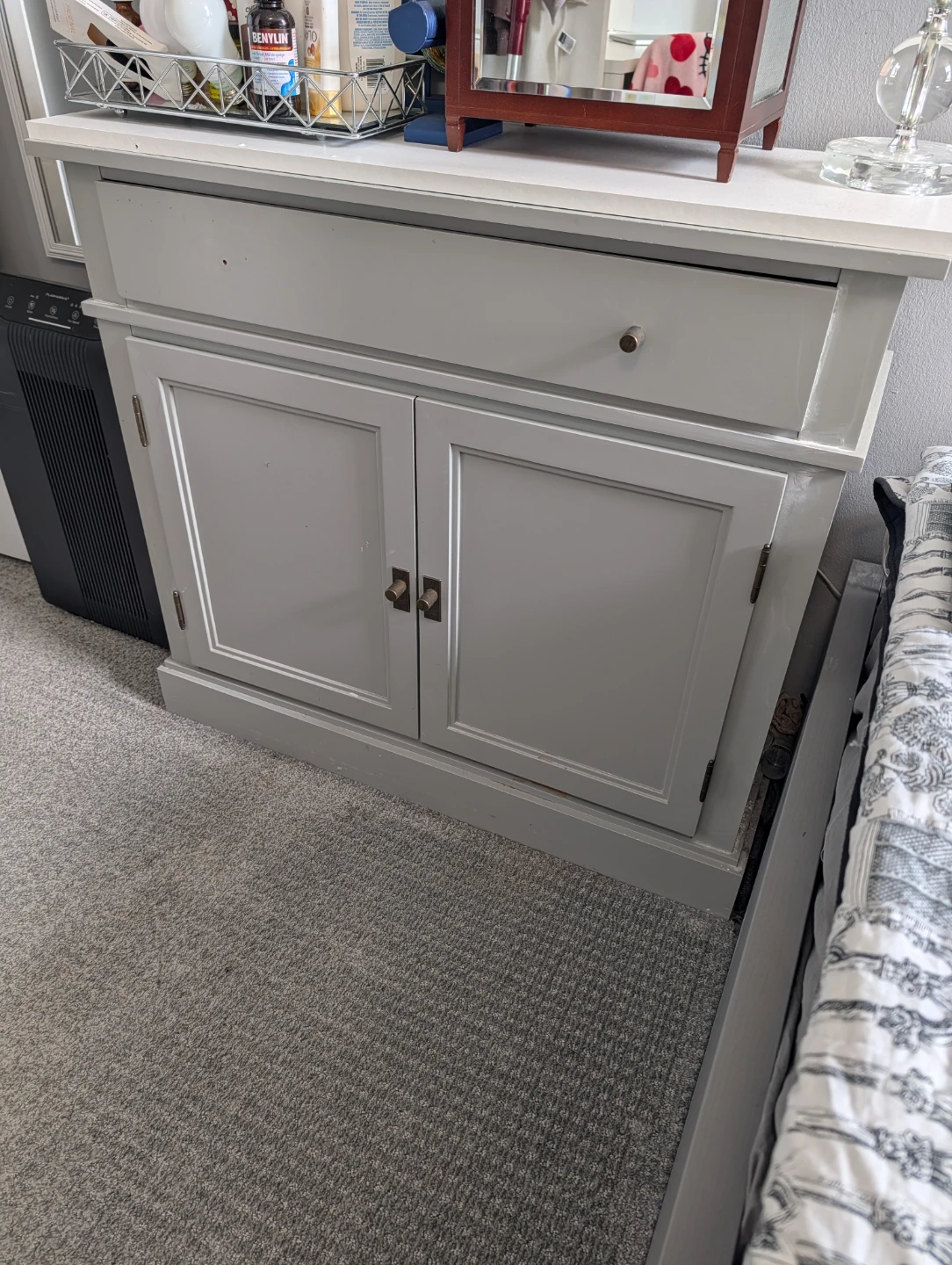 Grey wooden storage cabinet