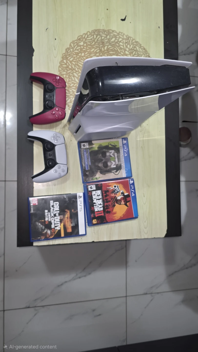 PlayStation 5 Console with Two Controllers and Three Games