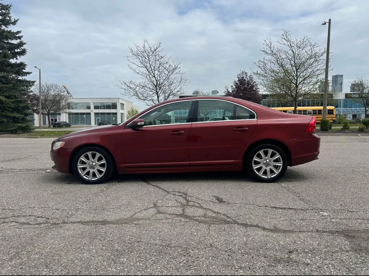 Red Volvo Sedan