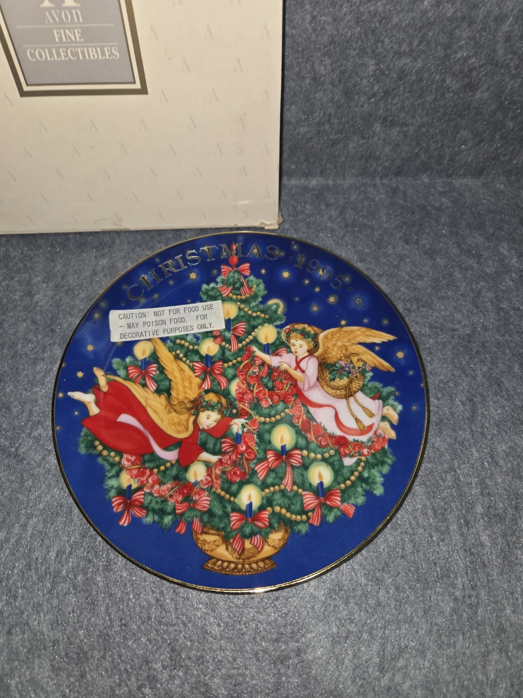 1995 Avon Trimming the Tree Christmas Plate