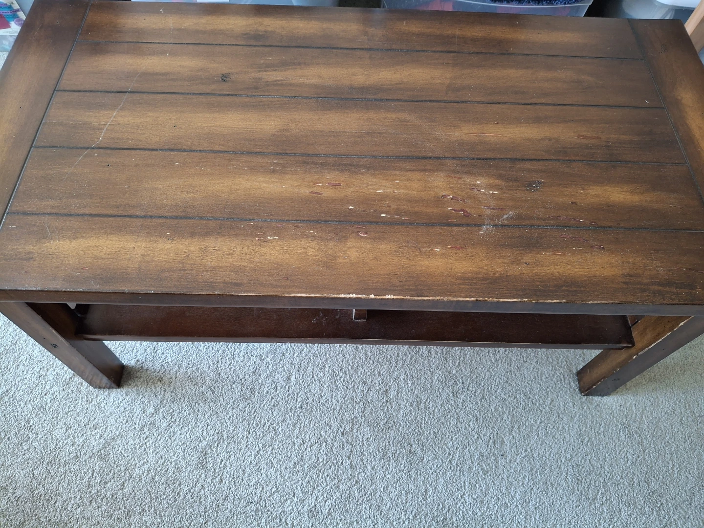 Wooden coffee table with lower shelf