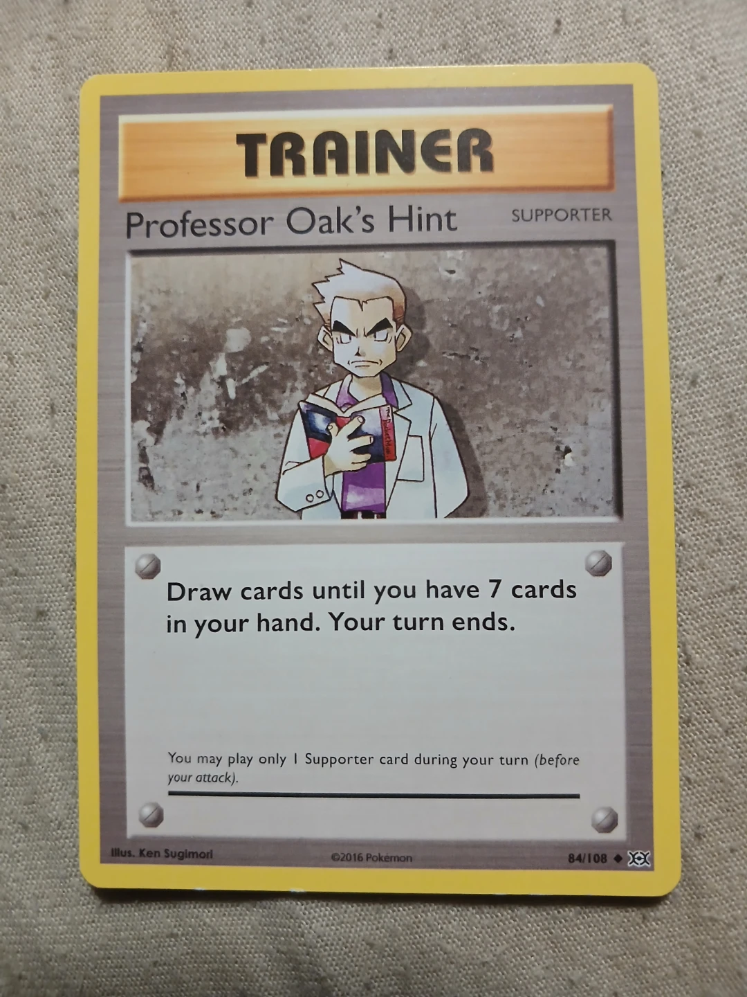 Professor Oak's Hint Trainer 84/108 2016 Pokémon Card