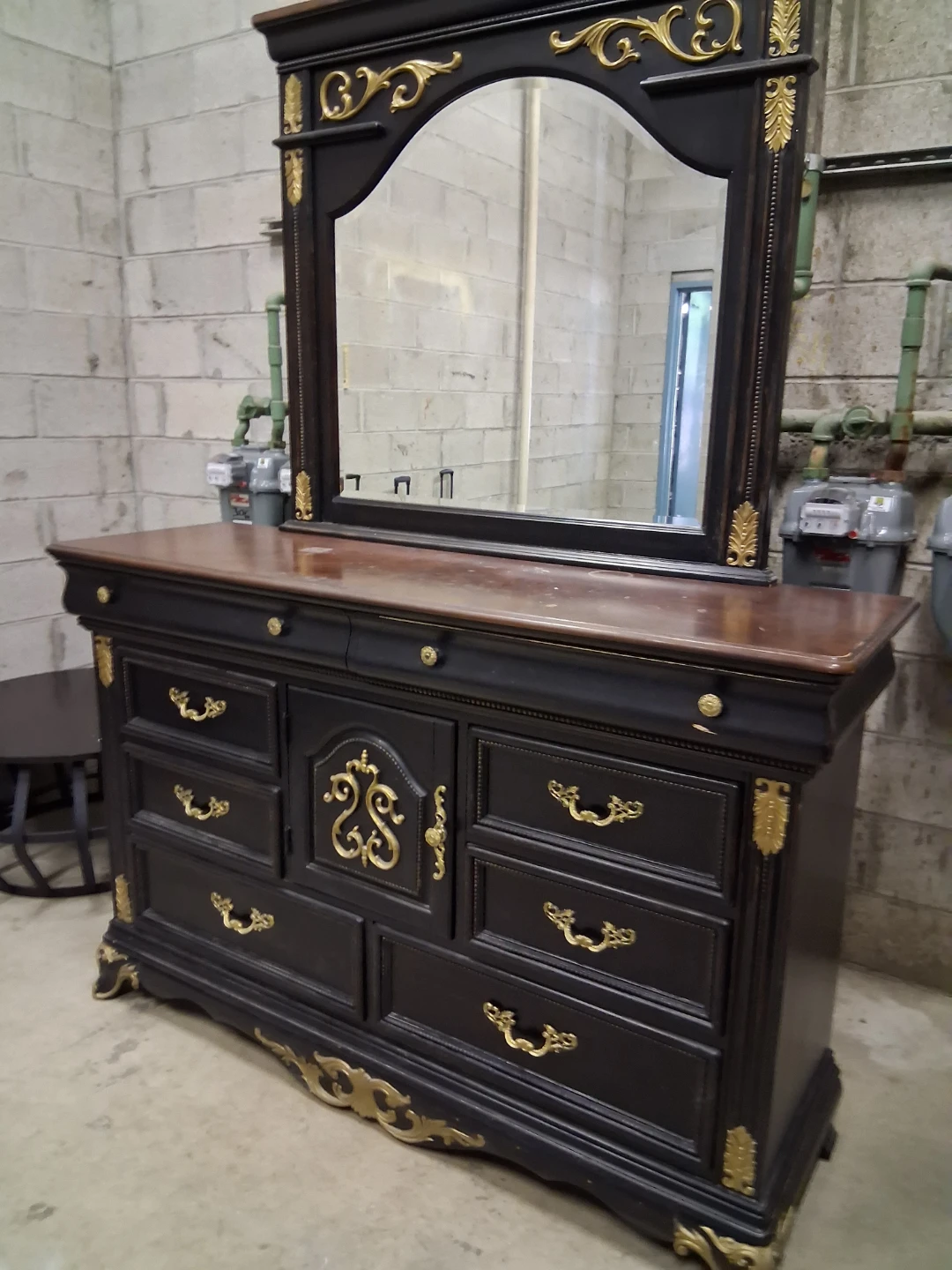 Black and Gold Dresser with Attached Mirror
