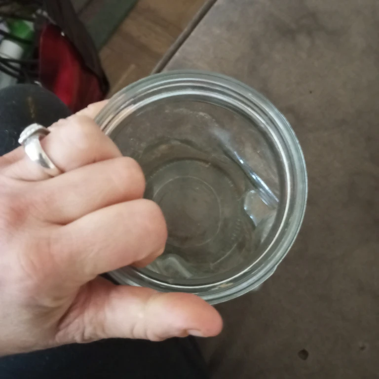Clear glass skull-shaped jar - photo 2