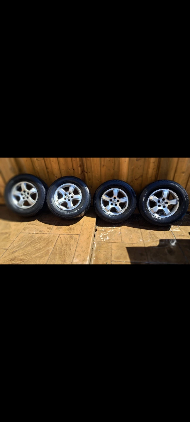 Set of 4 Honda Wheels with P235/70R16 Tires
