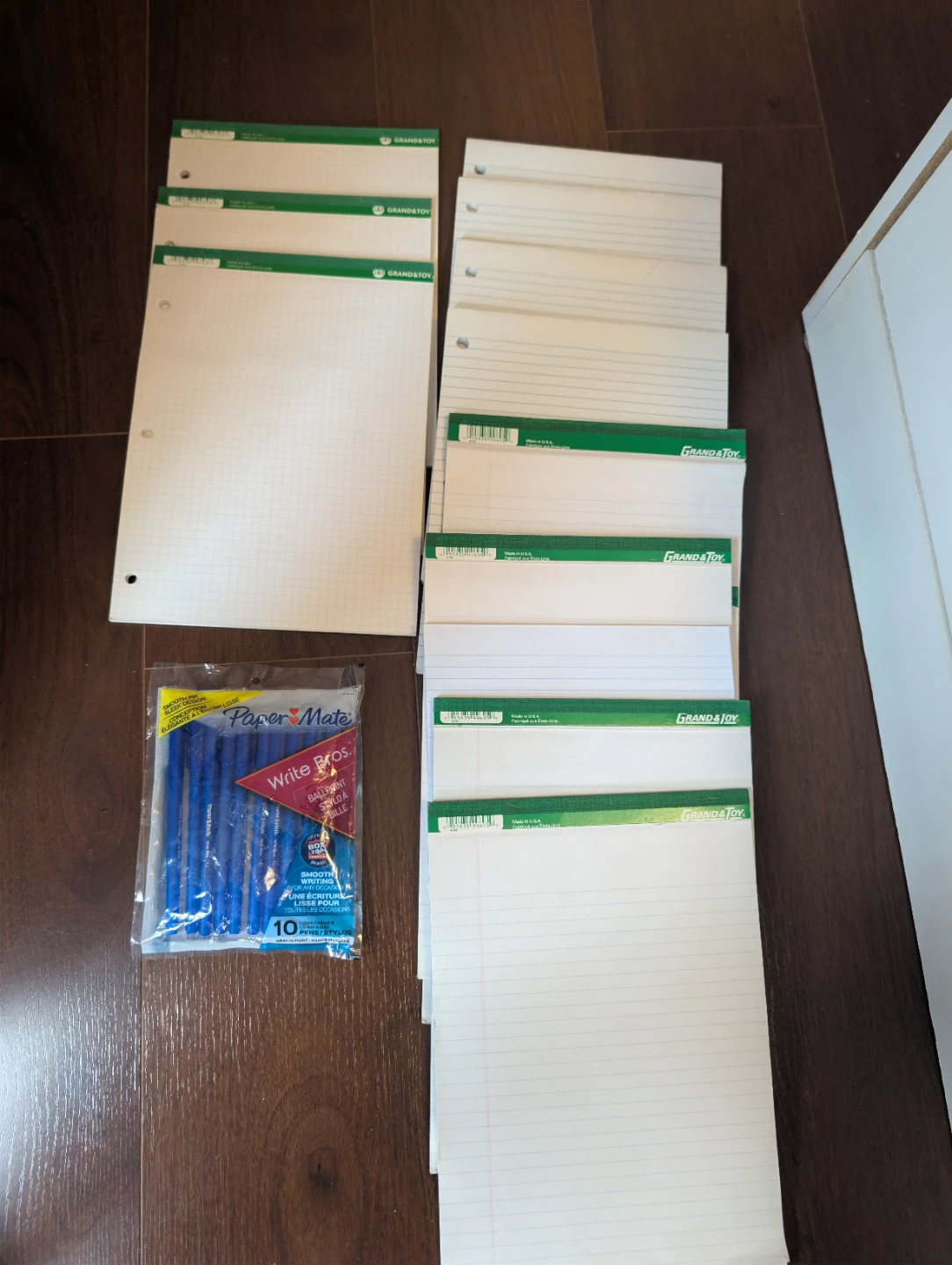 Paper Mate pens and Grand & Toy stationery pads