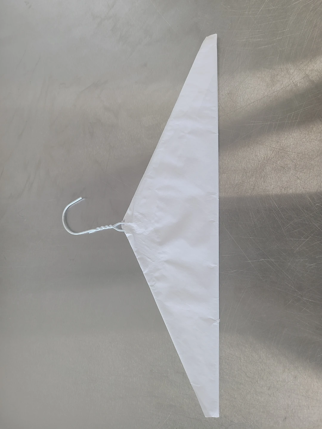 White Metal and Paper Hangers