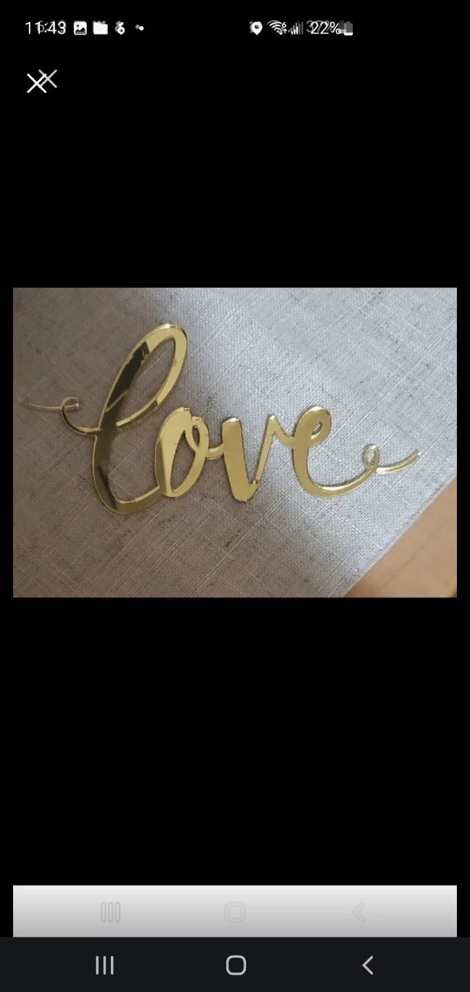 Gold Acrylic Love Sign🏈