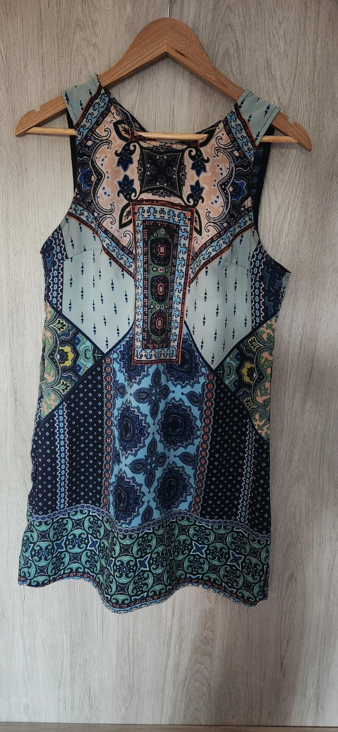 B. Darlin Sleeveless Patterned Dress