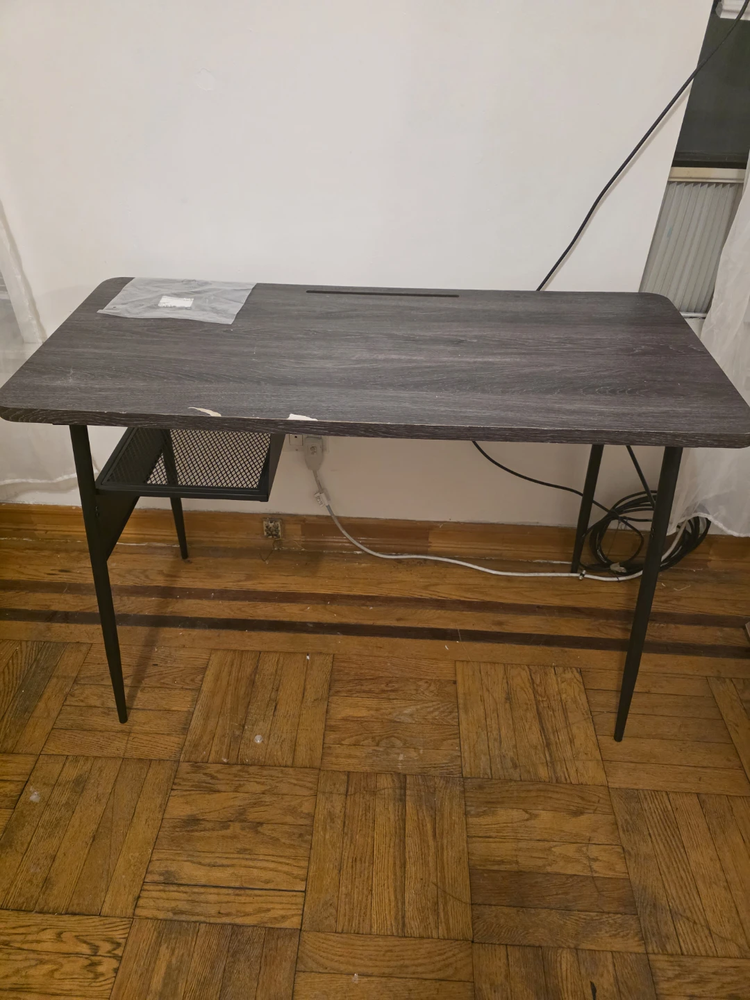 Dark wood grain computer desk in Brooklyn, NY