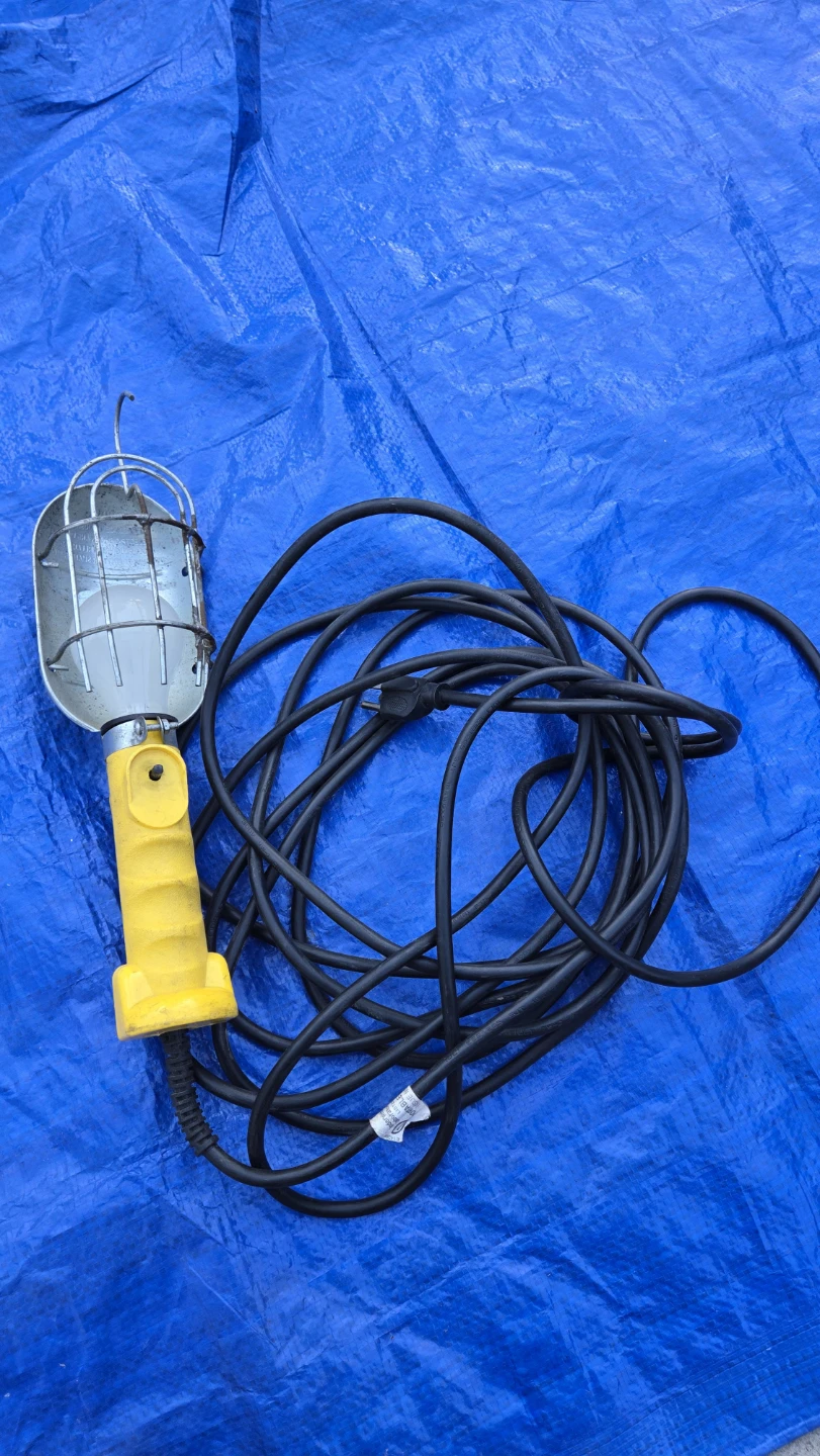 Hand-held work light with 24ft cord