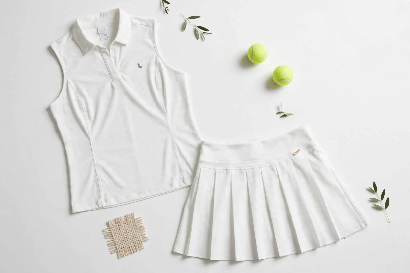 Lole White Sleeveless Polo and Pleated Skirt Set