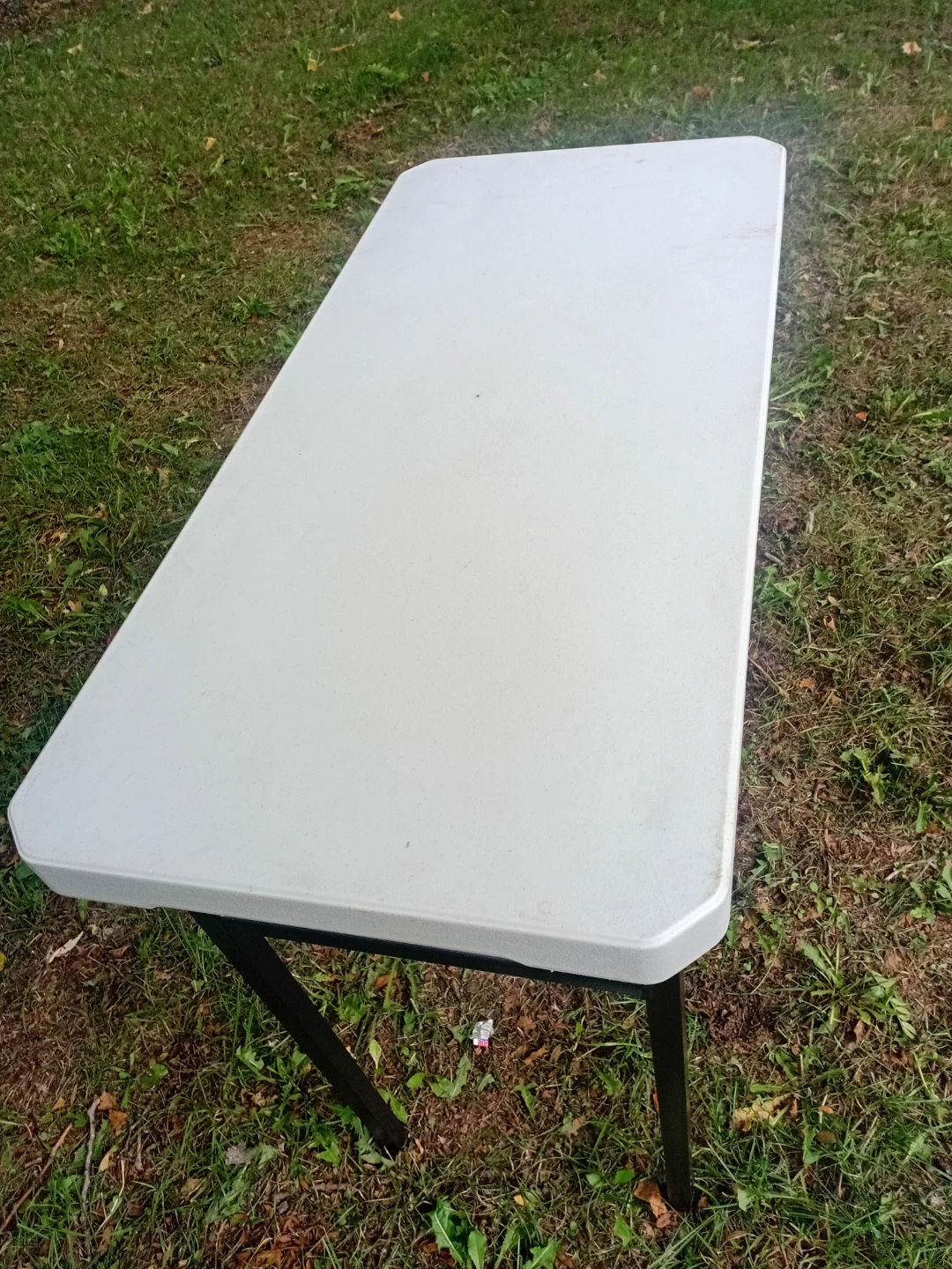 13 Foldable White Plastic Table = $400