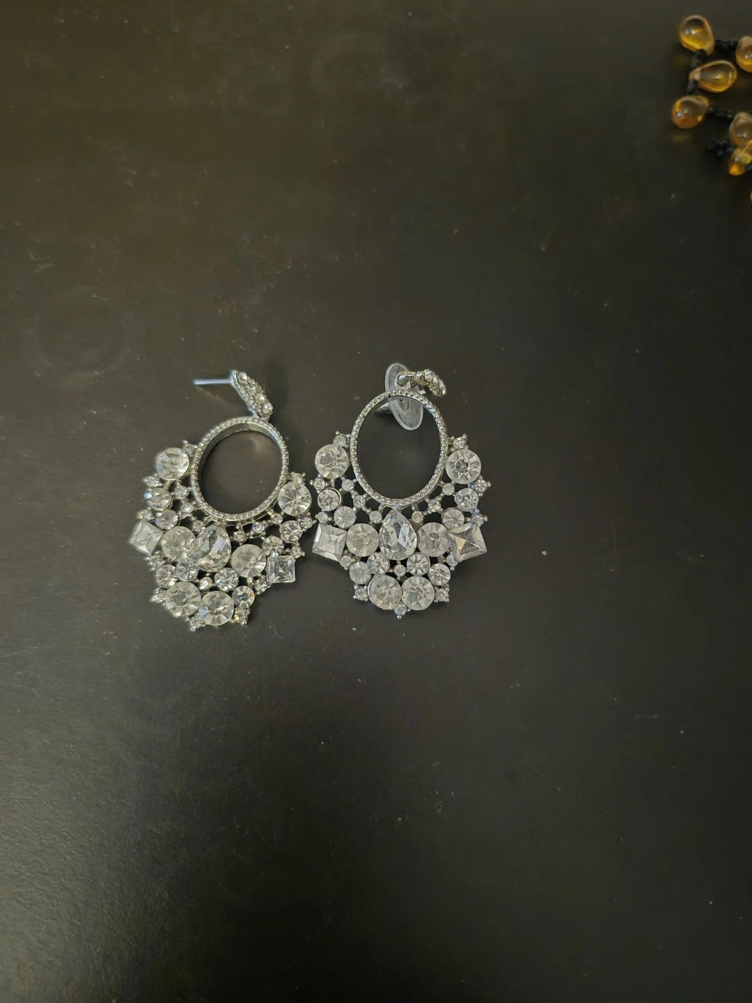 Silver-tone crystal statement earrings🏈