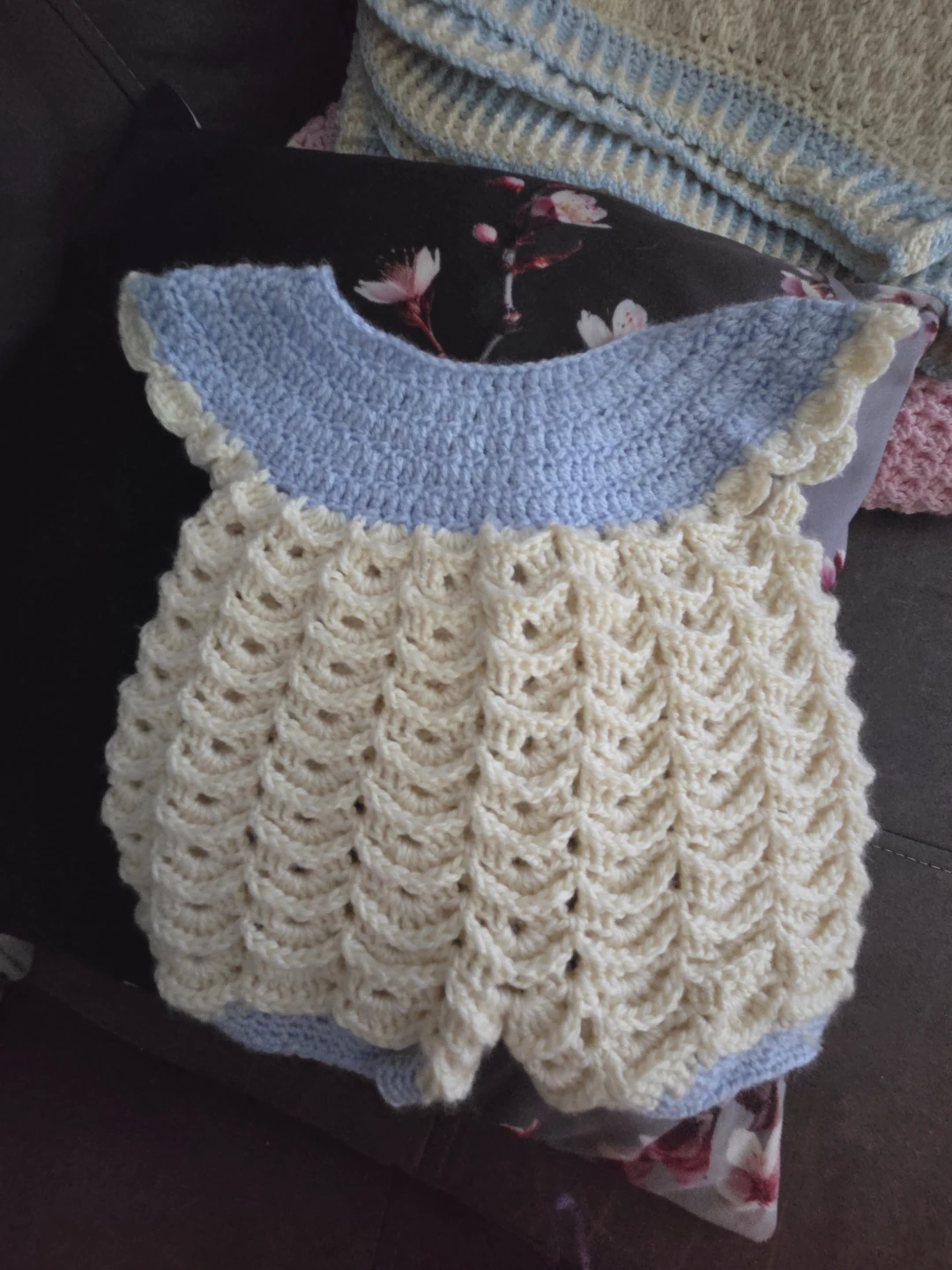 Hand-crocheted baby romper, cream and light blue