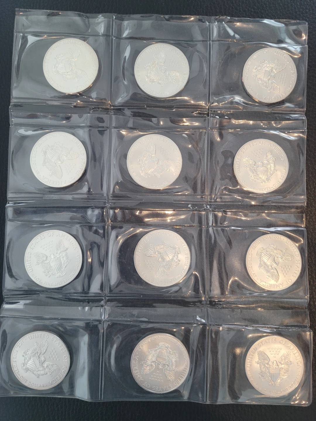 2011 American Silver Eagle Coins (12 Count) - photo 2