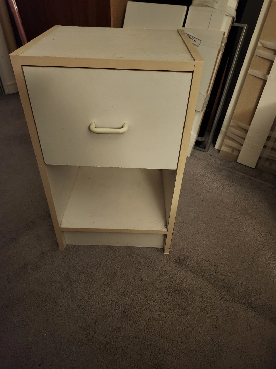 White bedside table with one drawer