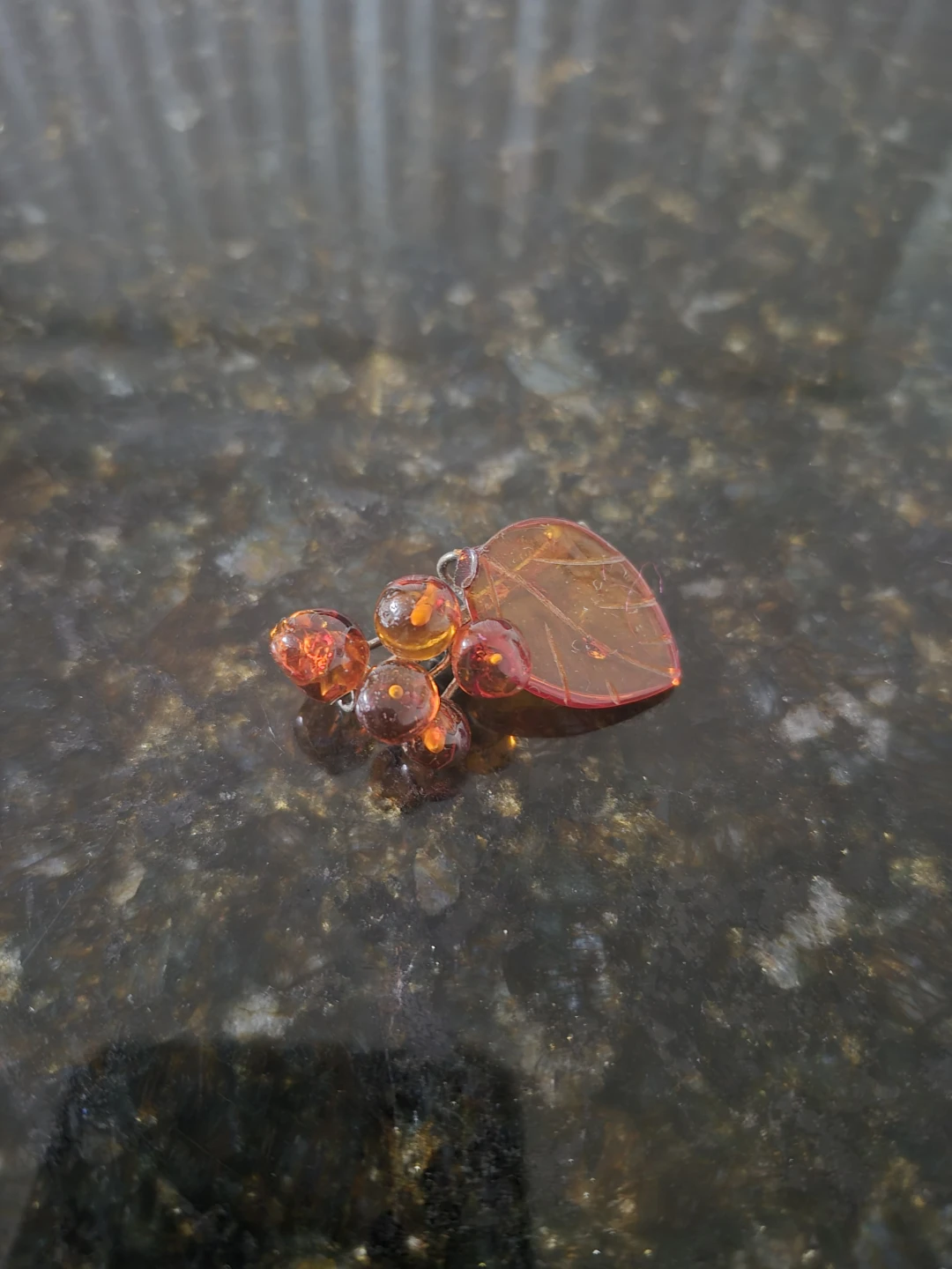 Amber leaf and berry brooch