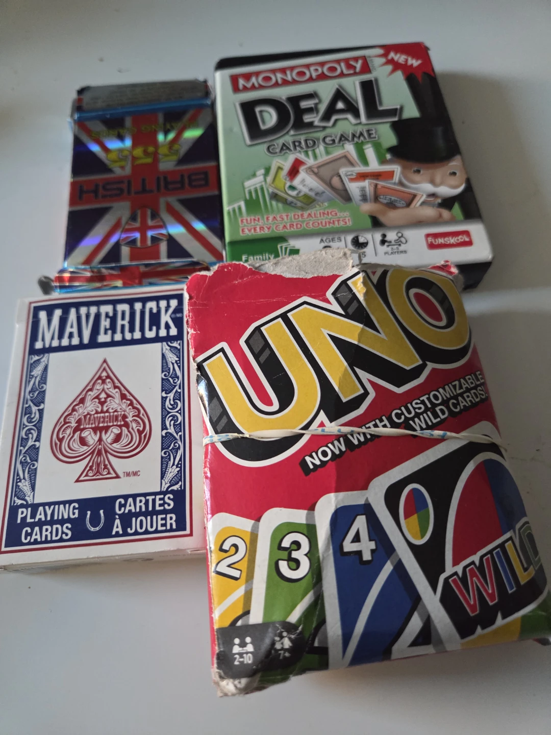 Set of 4 Card Games: Uno, Monopoly Deal, Maverick, 555