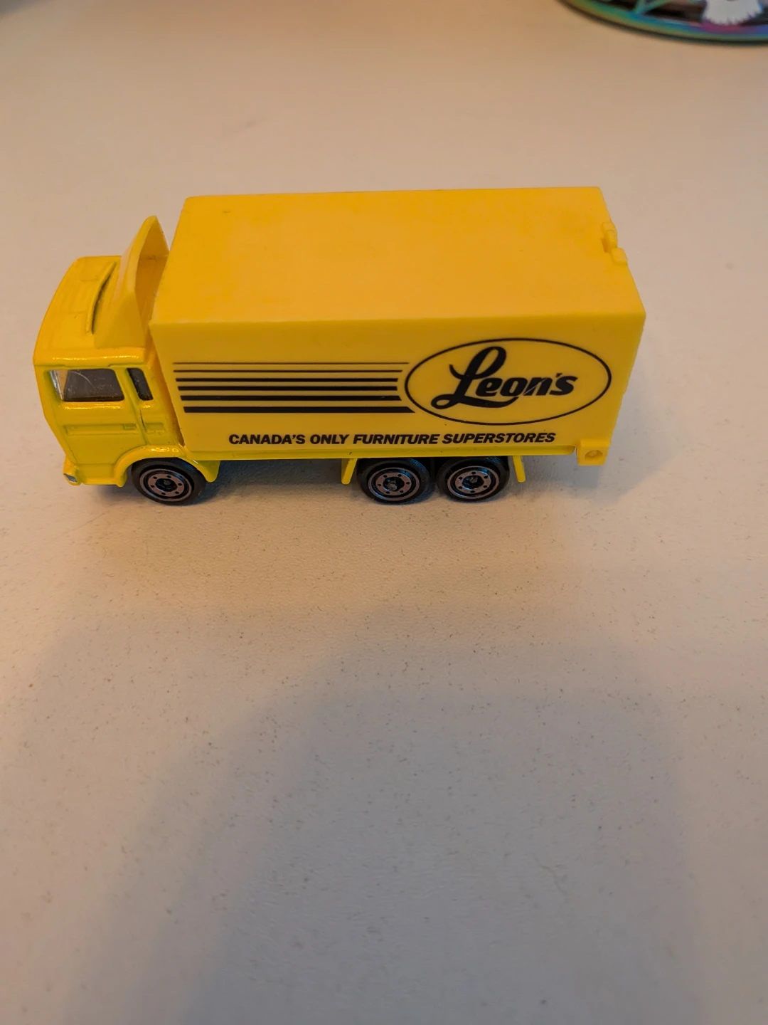 Vintage Leon's Furniture Die-Cast Toy Truck - photo 2