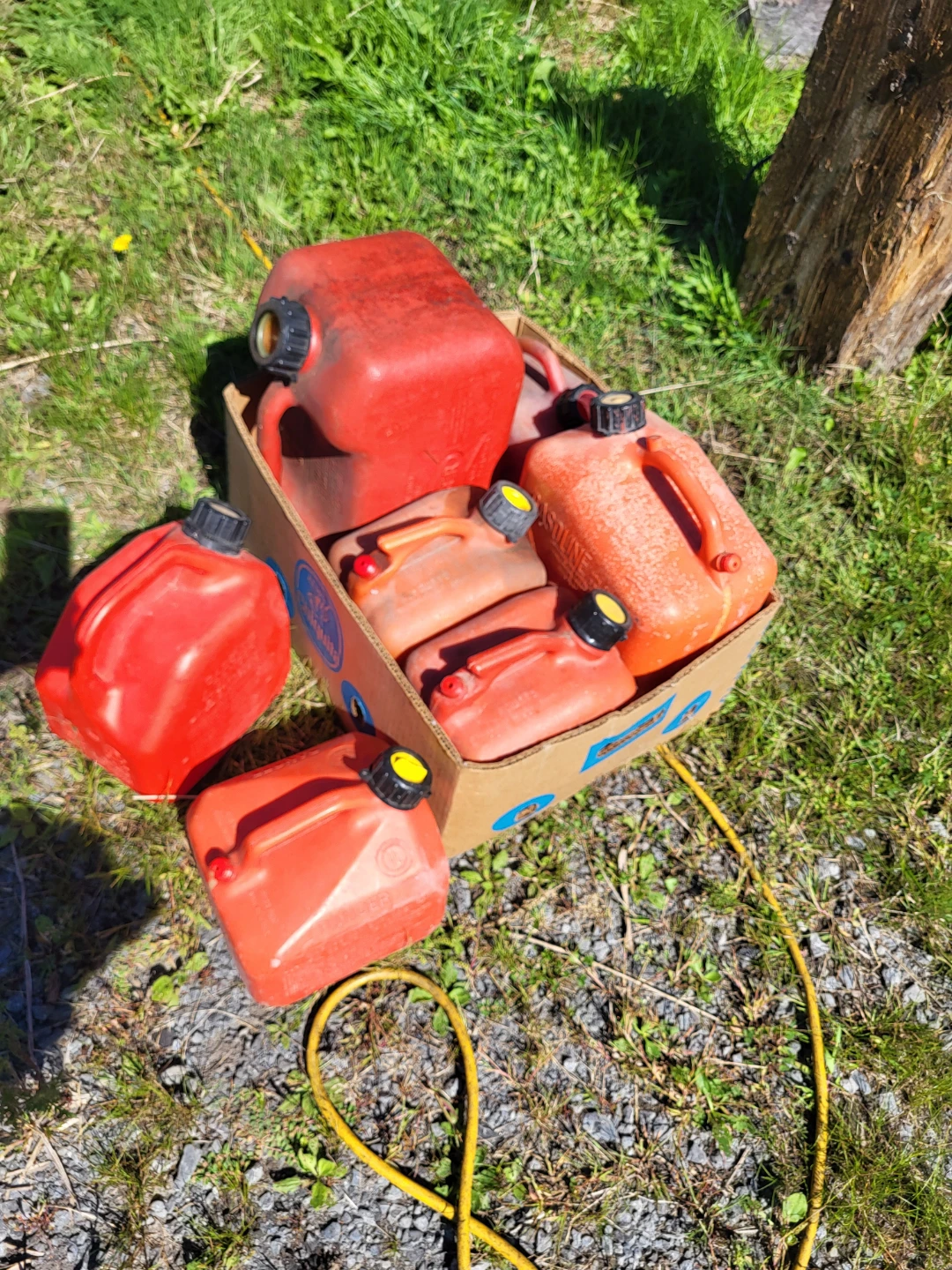Assorted Red Plastic Gas Cans