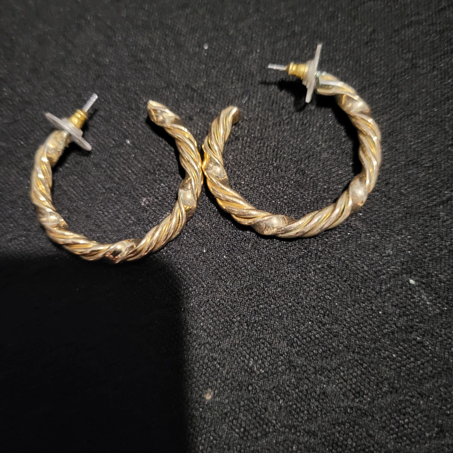Gold Tone Twisted Hoop Earrings