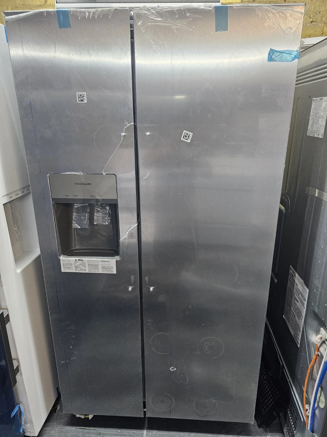 New Frigidaire Side-by-Side Stainless Steel Refrigerator