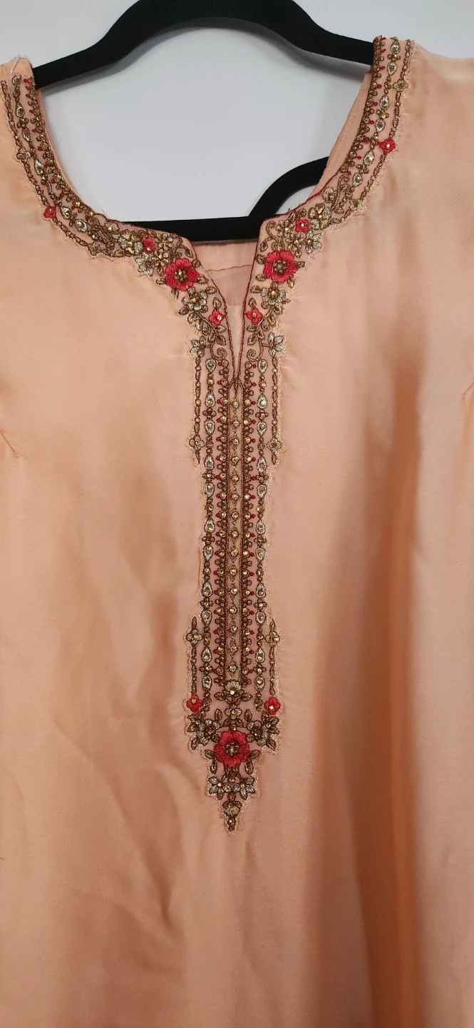 Embroidered peach kameez with red dupatta