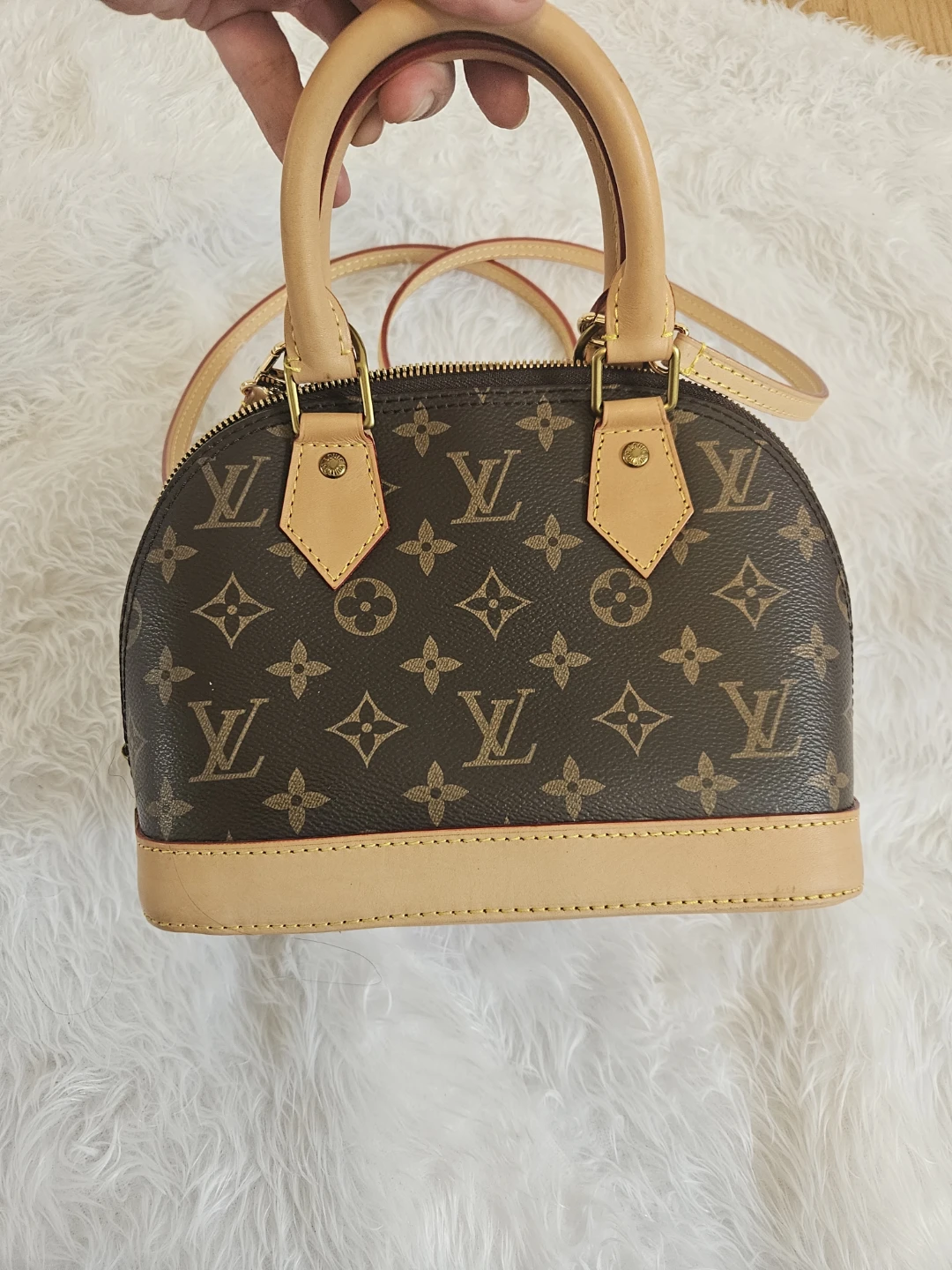 Louis Vuitton Alma BB Monogram Handbag