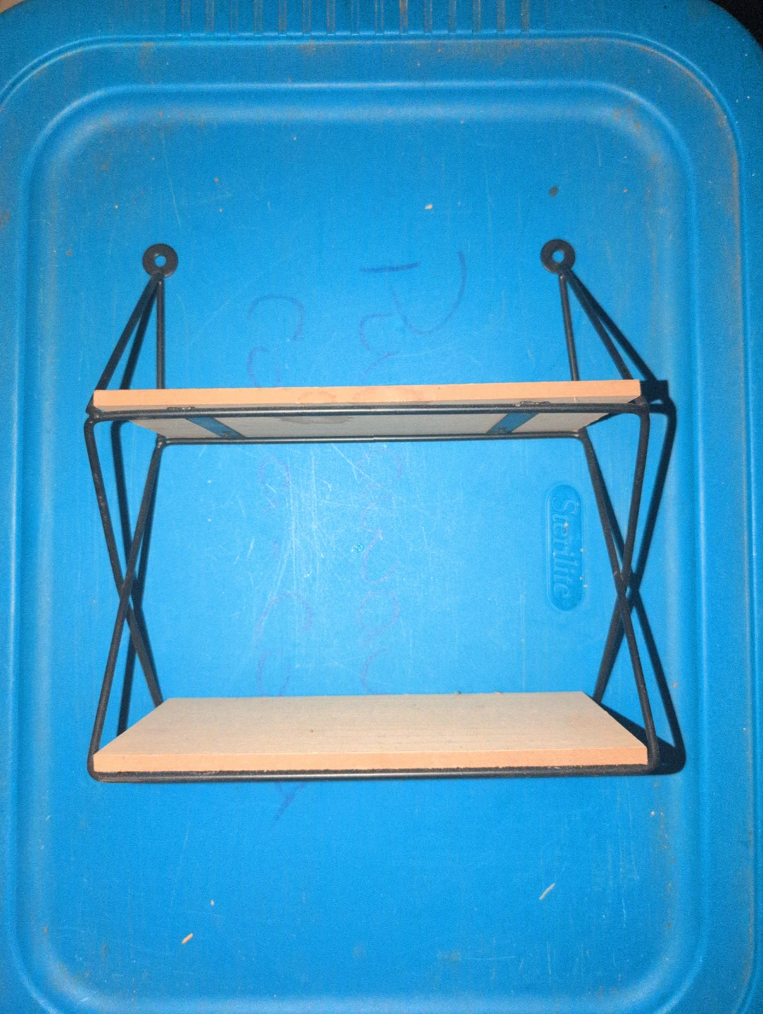 Two-tier metal and wood wall shelf