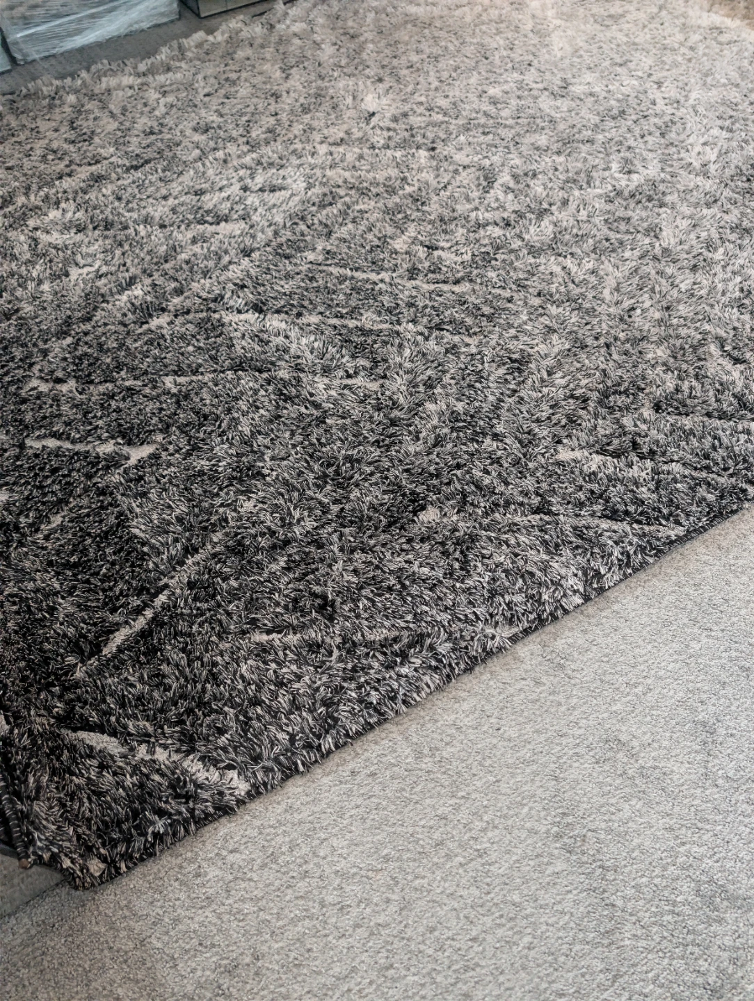 Black and white shaggy area rug