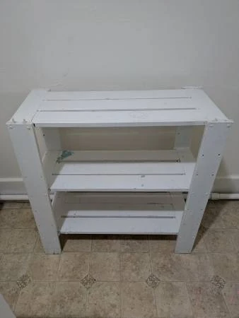 White three-tier wooden shelf unit