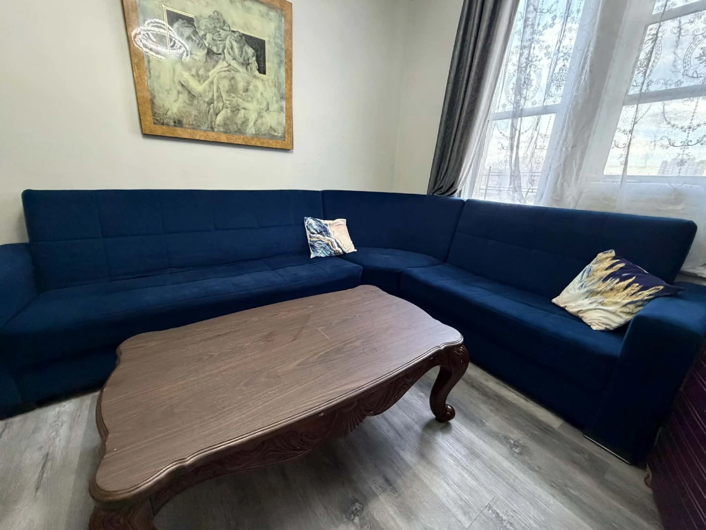 Wooden China Cabinet. Convertible L Sofa.  Wooden coffee Table