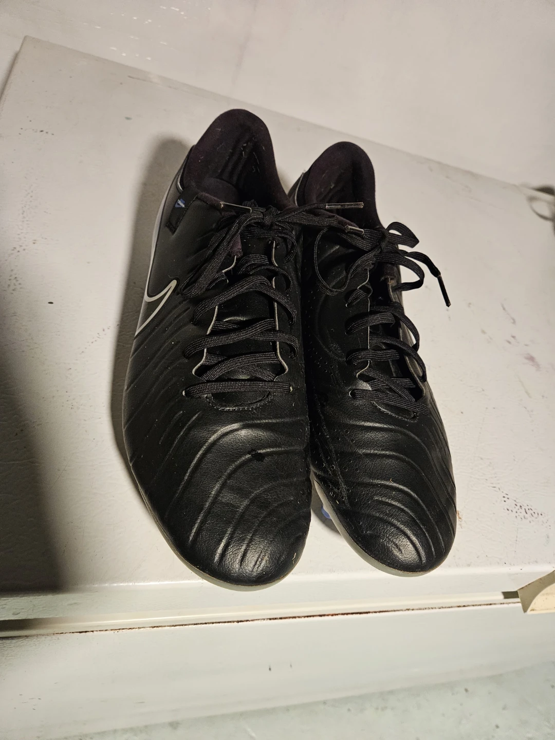Three pairs of assorted athletic cleats - photo 5