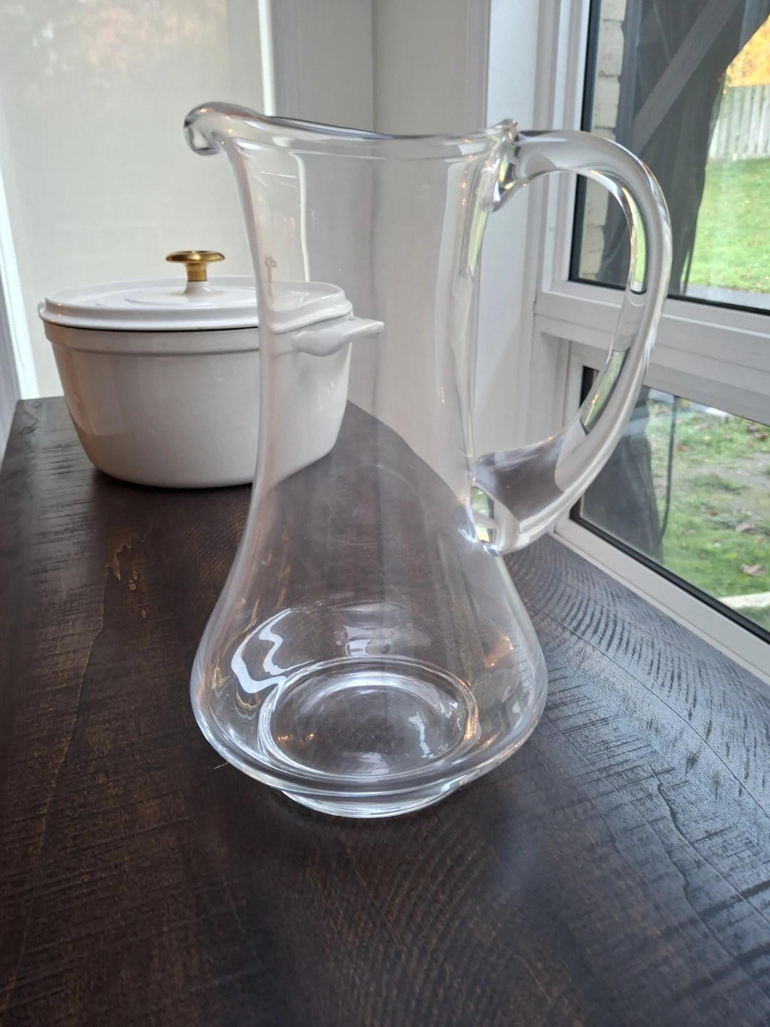 Solid glass water jug.