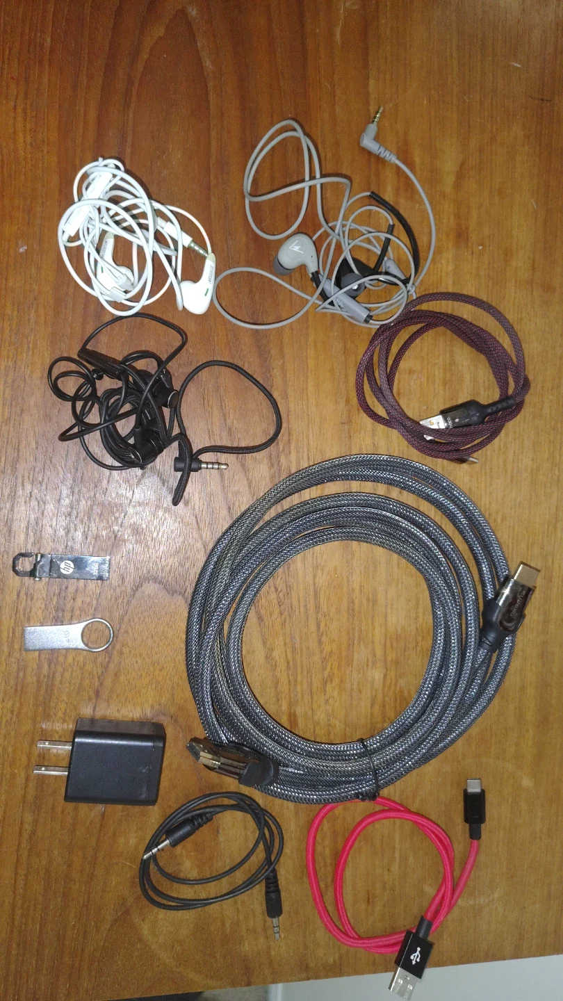 Assorted Cables, Earphones and USB Drives