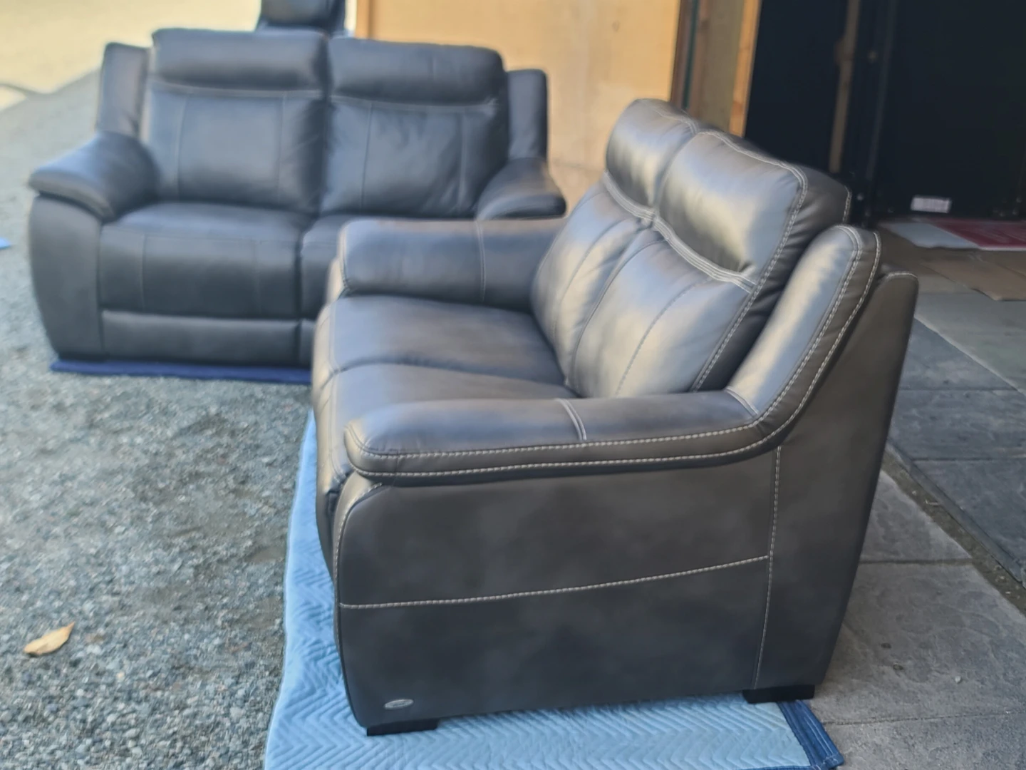 Pair of Grey Leather Loveseats