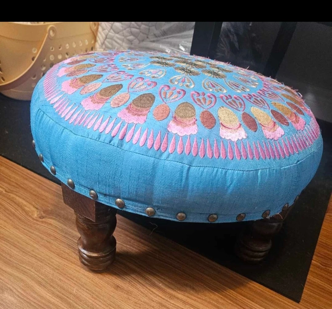 Embroidered round footstool