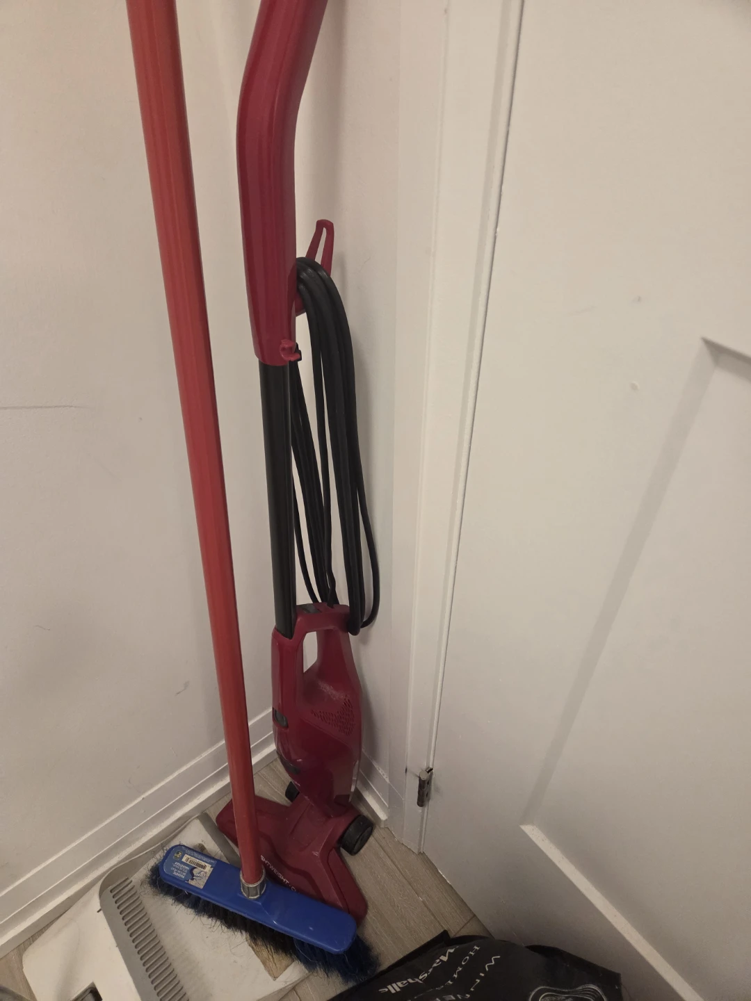 Red lightweight stick vacuum - photo 2