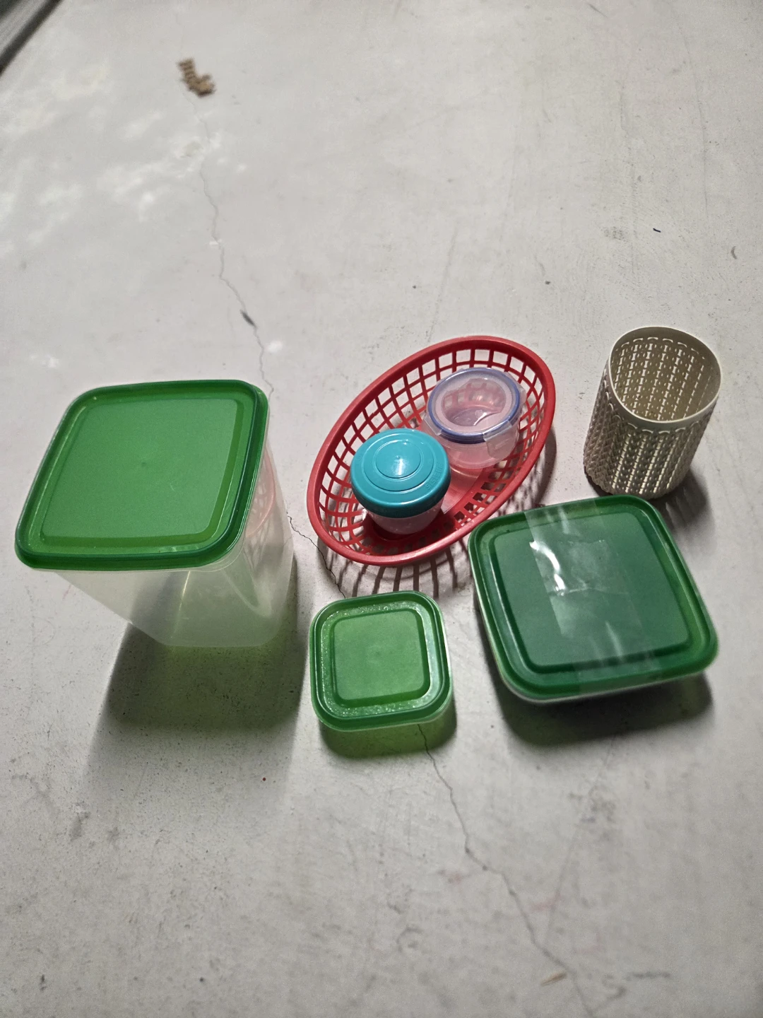 Assorted Plastic Kitchen Storage Containers and Basket