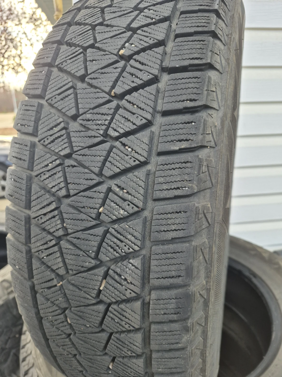 Two Bridgestone 225/65R17 102S Winter Tires - photo 2