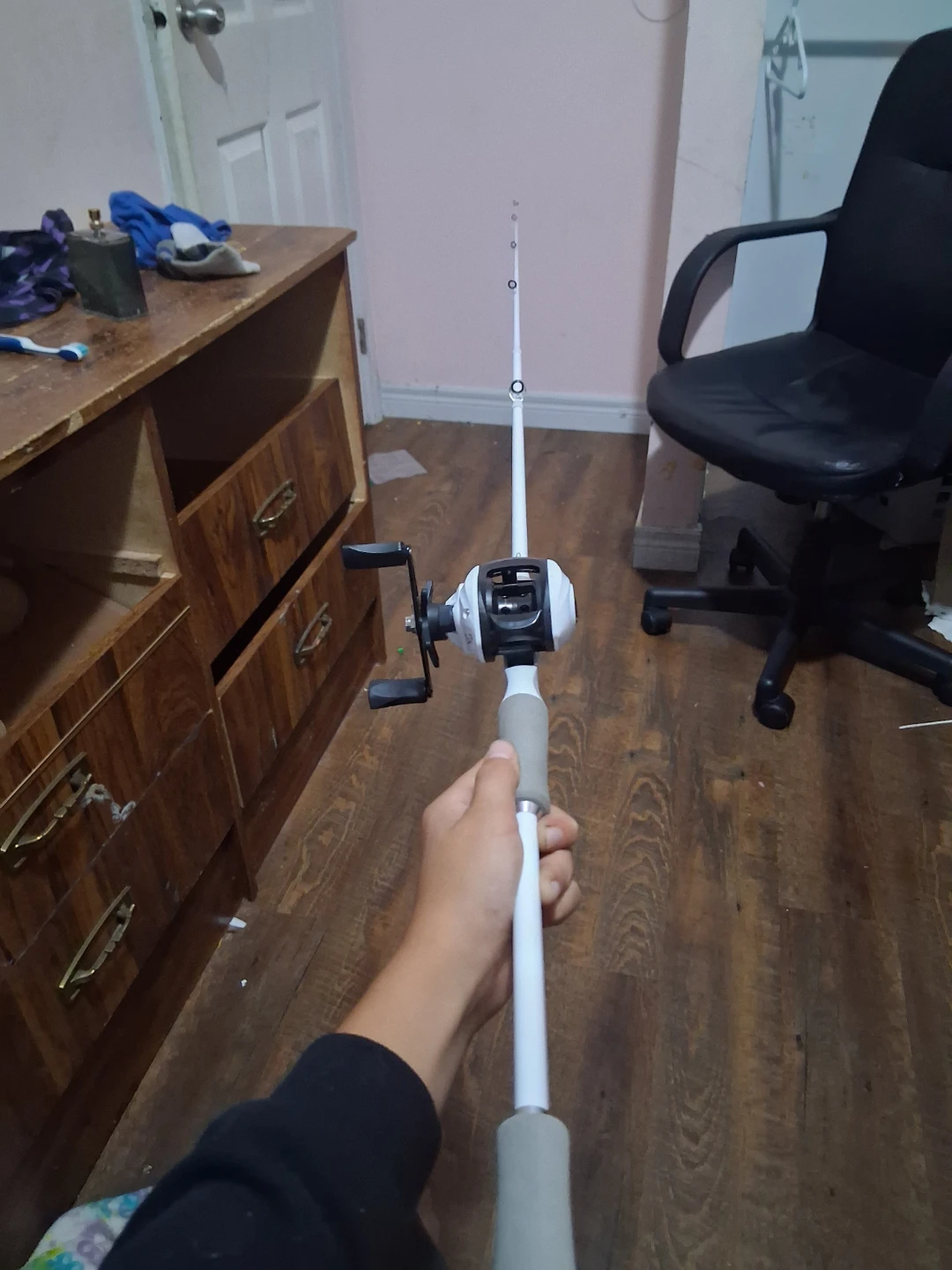 White baitcasting rod and reel It is 6ft and I bought it for 120