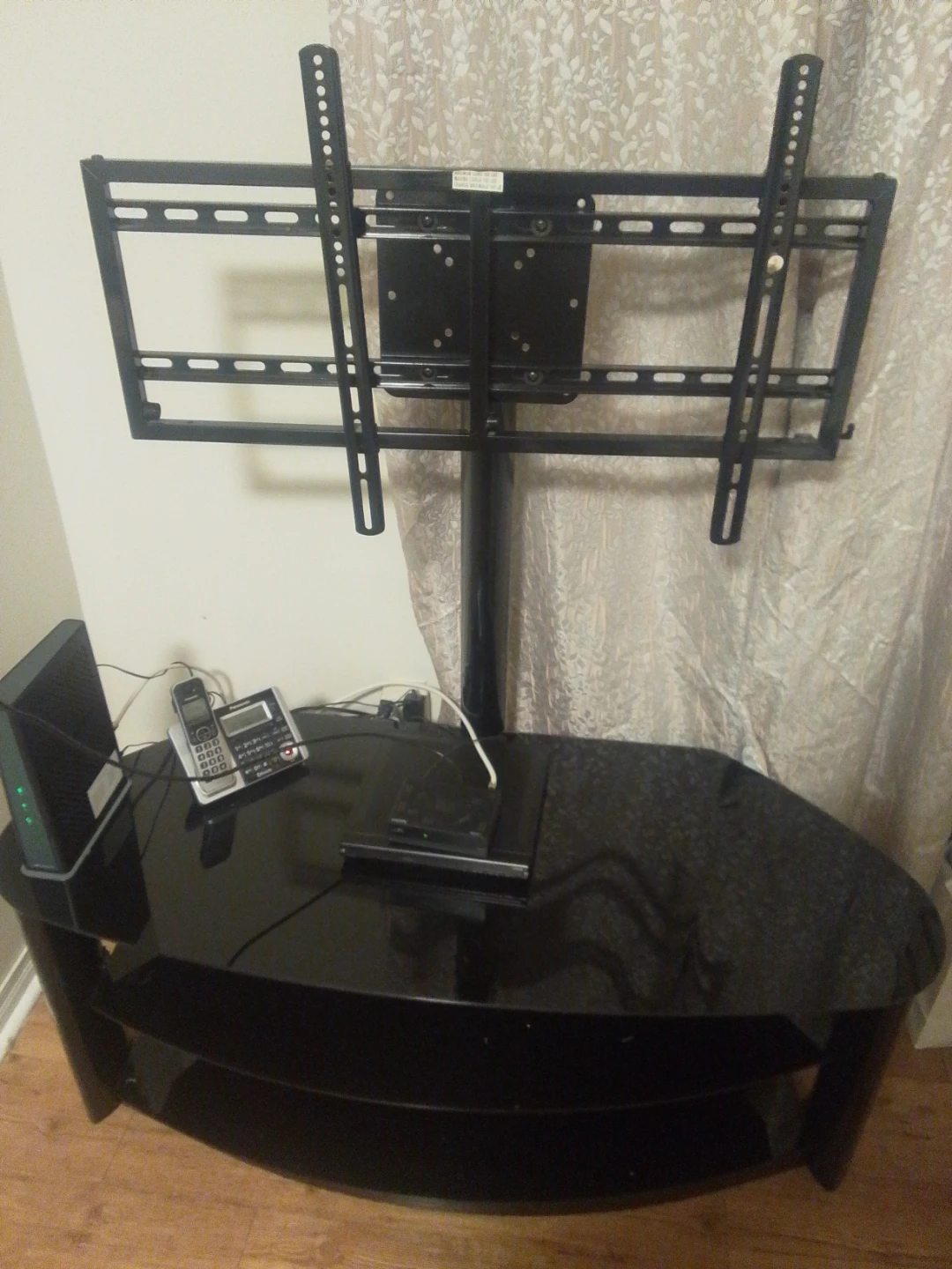 Black Glass TV Stand with Integrated Mount