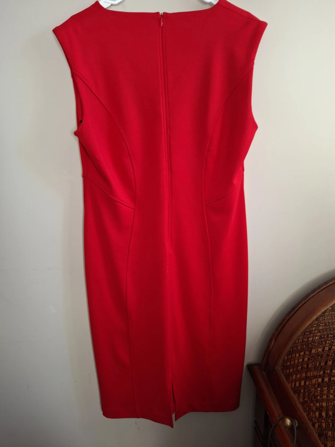 Five women's dresses and a light jacket