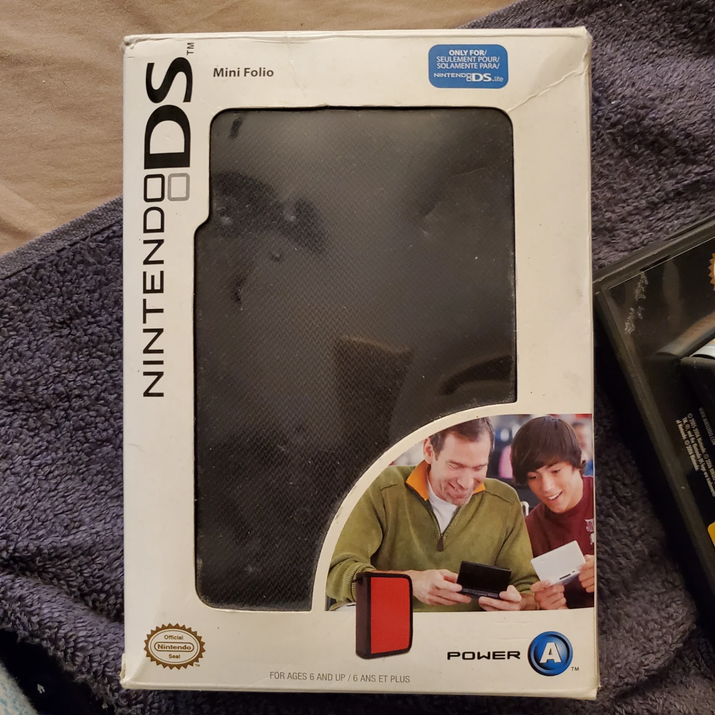 Nintendo DS Bundle with Mini Folio and 3 Games