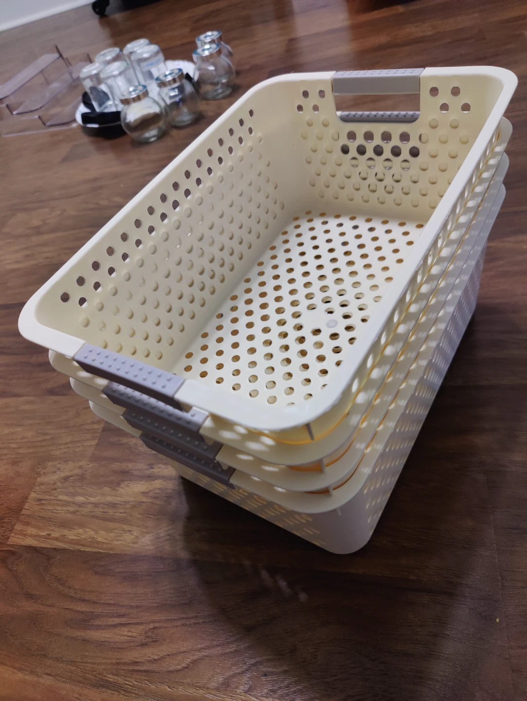 White plastic storage baskets