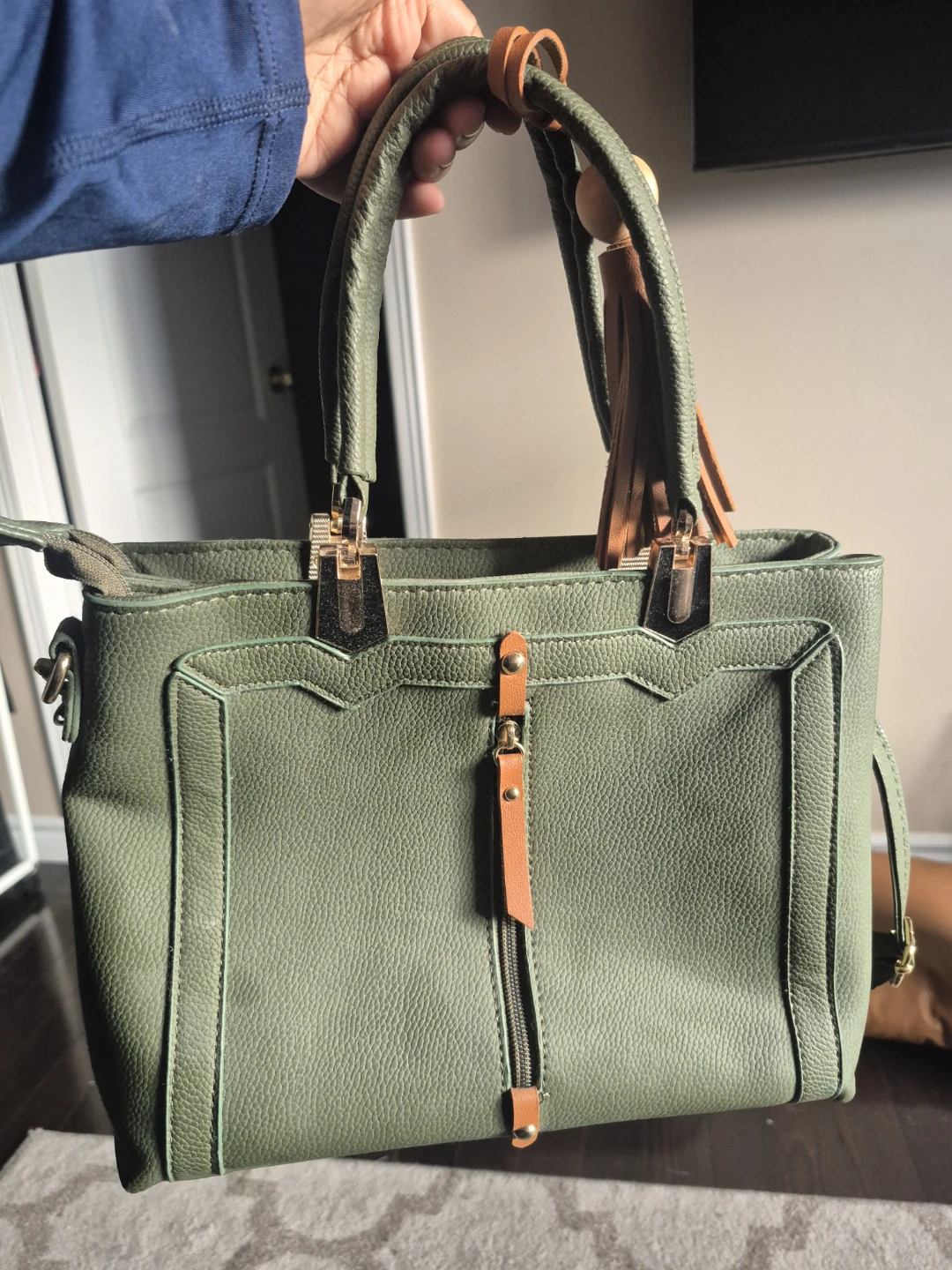 Green faux leather handbag